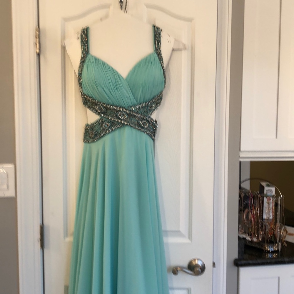 Long formal gown. Few beads missing.